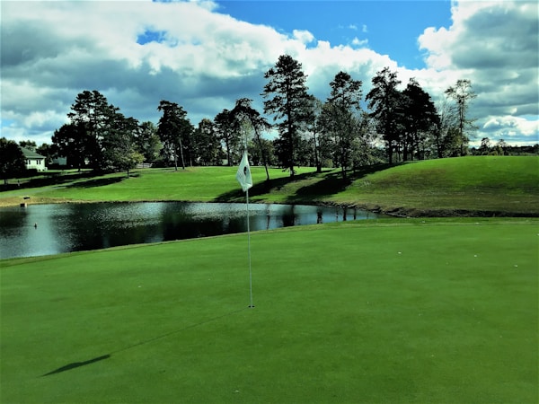 Golf green surrounded with water